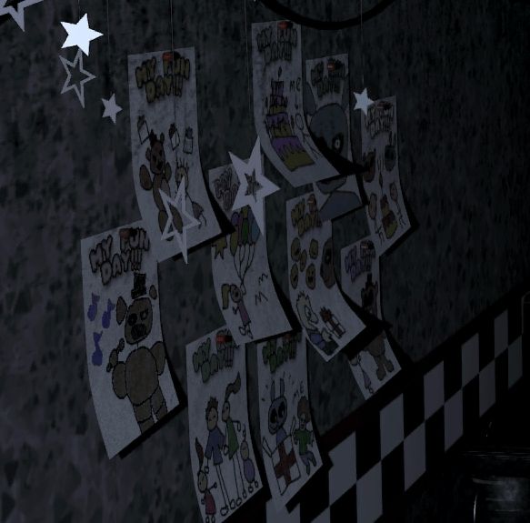 there are many pictures on the wall with stars hanging from it's ceiling and in front of them