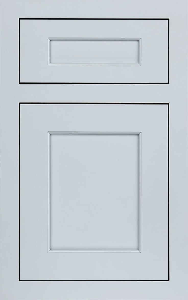 an image of two white kitchen cabinets