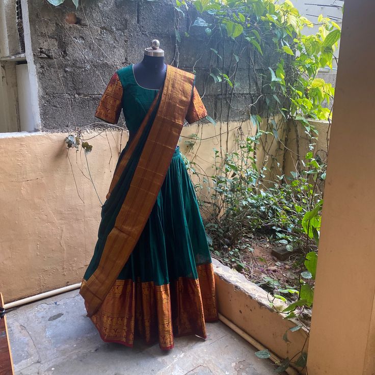 Wedding lehenga choli/ lehenga set with dupatta / teens lehenga/ bridal lehenga/ kids lehenga / narayanpet lehenga / crop top lehenga/ lehenga USA / Langa voni / voggish / green purple lehenga / pattu pavadai Here is a beautiful and traditional Indian pattu narayanpet cotton lehenga in green color paired with self color green border dupatta is a stunning piece for your upcoming parties!! It's a 3 piece set that includes skirt , can be done in other combinations and customizable !! Please contact Green Cotton Silk Lehenga For Eid, Cotton Silk Pre-draped Anarkali Saree, Cotton Silk Anarkali Pre-draped Saree, Designer Cutdana Choli In Maxi Length, Designer Chanderi Choli Maxi Length, Designer Chanderi Maxi Choli, Festive Cotton Silk Choli, Green Maxi Length Choli With Dupatta, Anarkali Floor-length Choli With Cutdana