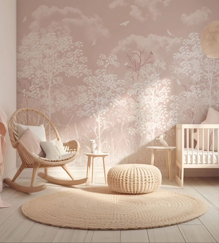 a baby's room with pink wallpaper and rocking chair