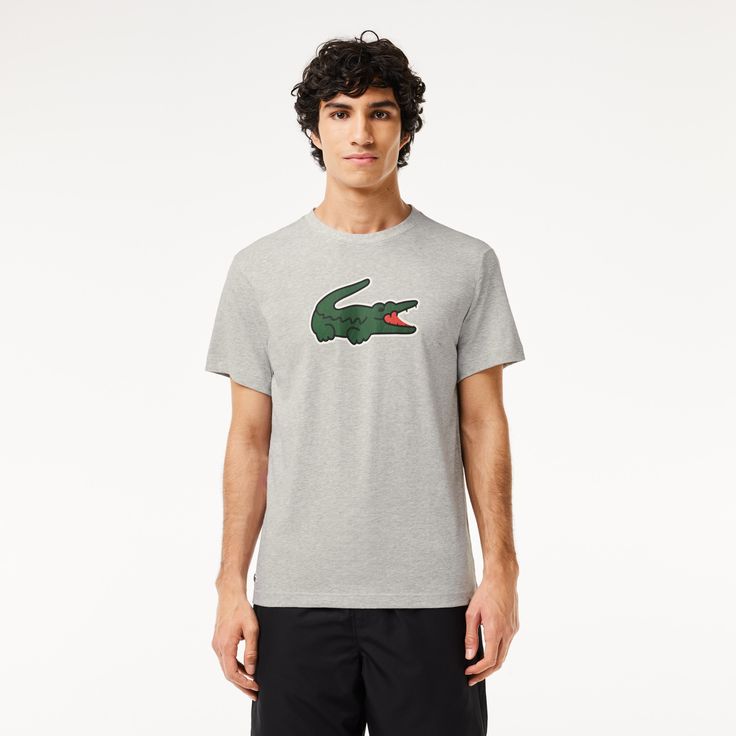 A T-shirt designed for intense exercise by Lacoste, sporting experts since 1933. Made from technical jersey, with cotton for comfort and Ultra Dry technology to wick away moisture. Plus an iconic, XL crocodile print for Lacoste signature style. Crew Neck T-shirt For Light Sports, Crew Neck Jersey T-shirt For Sports, Gray Crew Neck T-shirt For Light Sports, Athletic Heather T-shirt With Logo For Sports Season, Logo Print Crew Neck T-shirt In Athleisure Style, Logo Print Crew Neck T-shirt For Athleisure, Sportswear Jersey Crew Neck Top, Sporty Athletic Heather T-shirt With Moisture-wicking, Sportswear Jersey Tops With Crew Neck