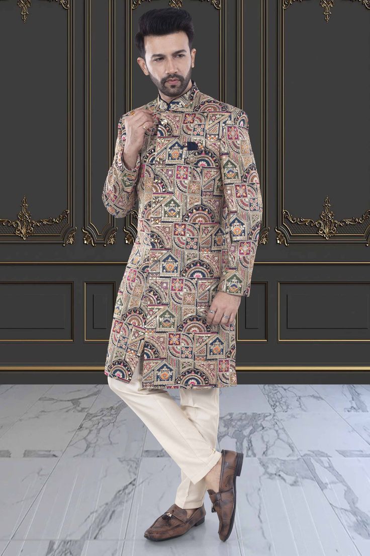 This multi-color sherwani for men is a versatile addition to any wardrobe. Crafted with precision, its unique design showcases expert tailoring and a blend of vibrant colors, making it perfect for any occasion. Express your personal style with confidence and make a statement wherever you go. Designer Fitted Traditional Wear For Winter, Fitted Long Sleeve Kurta With Naqshi, Fitted Nehru Jacket With Naqshi For Transitional Season, Fitted Kurta With Naqshi For Transitional Season, Traditional Fitted Sherwani With Multicolor Embroidery, Long Fitted Kurta With Naqshi, Designer Winter Kurta Fitted Style, Designer Fitted Winter Kurta, Designer Traditional Wear With Naqshi And Long Sleeves