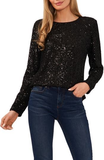 Splash some sparkle into a fun or fancy look with this twinkling top. 23" length ( size Medium) Jewel neck Long sleeves 95% polyester, 5% spandex Hand wash, dry flat Imported Twist Front Top, Sequin Blouse, Kids Trend, Mens Trends, Sequin Top, Oversized Sweatshirt, Back To Black, Kids Jacket, Long Sleeve Top