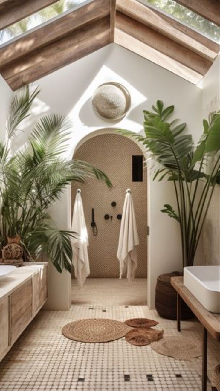 a bathroom with a skylight and plants in it