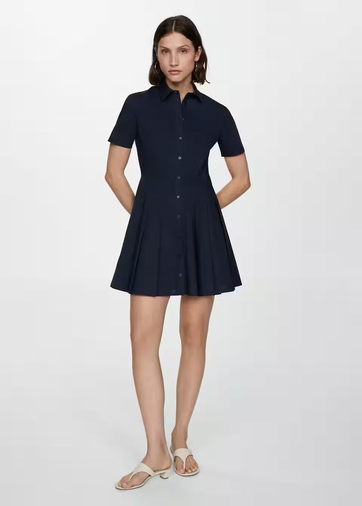 Pleated shirt dress - Women | Mango USA Classic A-line Cotton Shirt Dress, Formal A-line Cotton Shirt Dress, Casual Collared Neckline Shirt Dress For Office, Casual Collared Shirt Dress For Office, Collared Shirt Dress With Placket For Work, Fitted Shirt Dress With Placket For Work, Fitted Workwear Shirt Dress With Placket, Formal Collared Shirt Dress With Placket, Chic Cotton Dresses For Business Casual