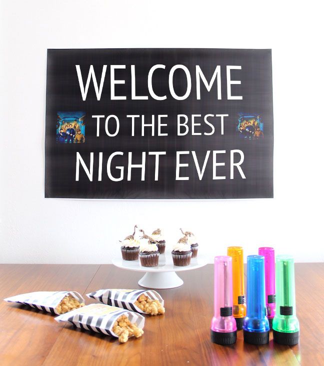 a sign that says welcome to the best night ever with cupcakes and crayons