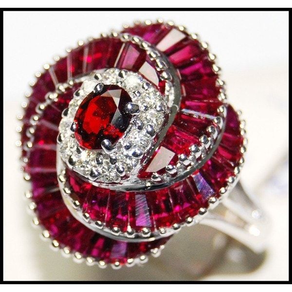 Our jewelry is entirely handmade in our Thailand studio. We focus on bringing creative and symbolic design to fine jewelry crafted in precious metal and set with superior quality gemstones and diamonds. For more Ruby Rings, click here: https://www.etsy.com/shop/BKGjewels?section_id=18901601 Ring information Metal: White Gold 18 Karat Gold Weight: 8.00 grams Size: 7 (US)  N (UK) Appraisal Value: $5899 Ruby information: Shape or Cut: Oval and Square Quantity: 1 and 44 Stones Total Weight: 0.45 and 4.36 carats (100% Genuine Natural) Clarity: Eye very clean Color: Red Diamond information: Shape or Cut: Round Brilliant Quantity: 12 Stones Total Weight: 0.23 carats (100% Genuine Natural) Clarity: Eye clean SI1-2 Color: G-H Colorless FEATURES - This item can be made with a variety of gemstones or Diamond Cocktail Ring, Sapphire Solitaire, Ruby Pendant, Diamond Cocktail Rings, Ruby Jewelry, Earrings Unique, Bling Rings, I Love Jewelry, Sapphire Earrings