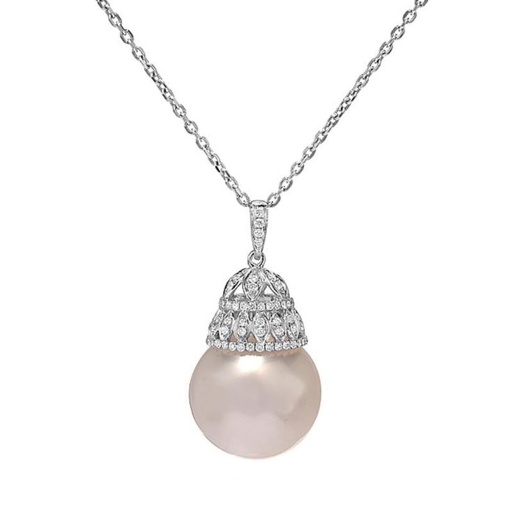 This feminine pendant features a lustrous 16.5 mm South Sea pearl with 0.40 carats of VS clarity round diamonds. The pearl is lustrous and uniform in surface color all around. A royal design set in 18K white gold. Chain Length: 18 inches Pendant Length: 2 1/8 inches Pendant Width: ½ inch Elegant Round Diamond Necklace With Detachable Pendant, Formal White Gold Diamond Necklace With Detachable Pendant, Elegant Silver Diamond Necklace With Detachable Pendant, Elegant Diamond Necklace With Detachable Cubic Zirconia Pendant, Formal Diamond White Necklace With Detachable Pendant, Luxury Diamond Necklace With Pearl Drop, Formal Diamond Necklace With Detachable Round Pendant, Luxury White Gold Pearl Necklace For Evening, Luxury Pearl White Necklace With Diamond Accents