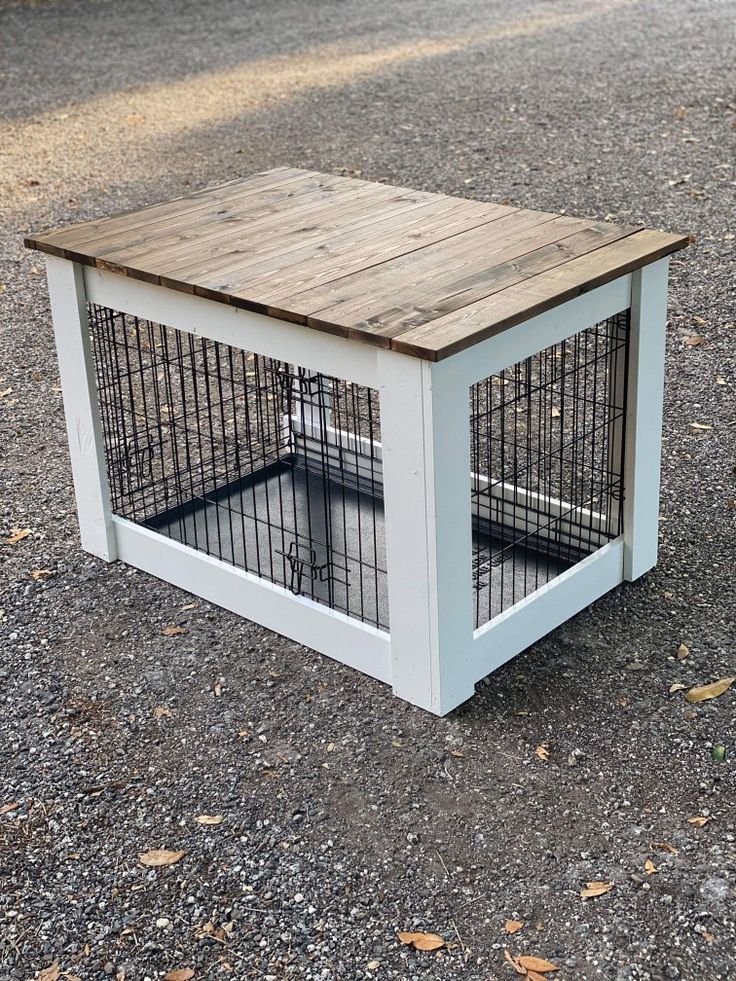 a dog crate that is sitting on the ground