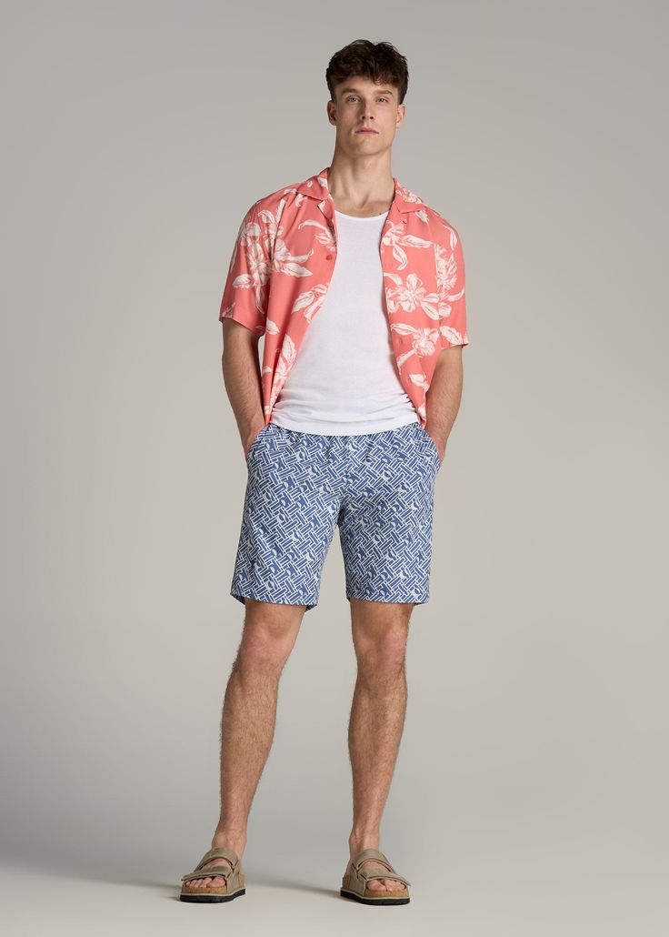 Make a Splash: Essential Swim Trunks for Tall Guys Dive Into Comfort & Style Ready to dive into summer? Our Volley Swim Shorts are here to ensure you do it in style. Crafted from quick-drying woven fabric, these tall men's swim trunks are designed for the guy who's ready to comfortably go from pool to party, featuring a stretch waistband with an external drawstring for a perfect, secure fit. Whether you're hitting the waves or lounging poolside, the above-knee length offers the ideal balance of Blue Shorts For Vacation Warm Weather, Blue Tropical Shorts For Summer, Tropical Blue Bottoms For Summer, Casual Shorts For Poolside Warm Weather, Casual Swim Trunks For Spring Poolside, Beachwear Bermuda Bottoms For Poolside, Casual Blue Shorts For Warm Weather, Casual Bermuda Swim Trunks For Beach Season, Bermuda Cotton Swim Trunks For Vacation