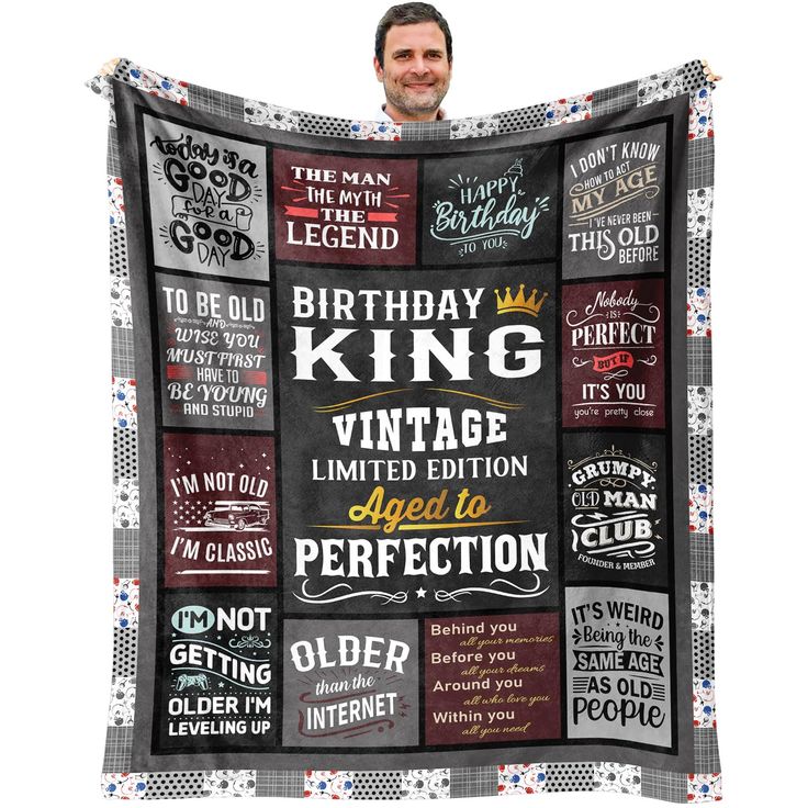 a man is holding up a blanket that says, birthday king vintage limited edition aged to perfection