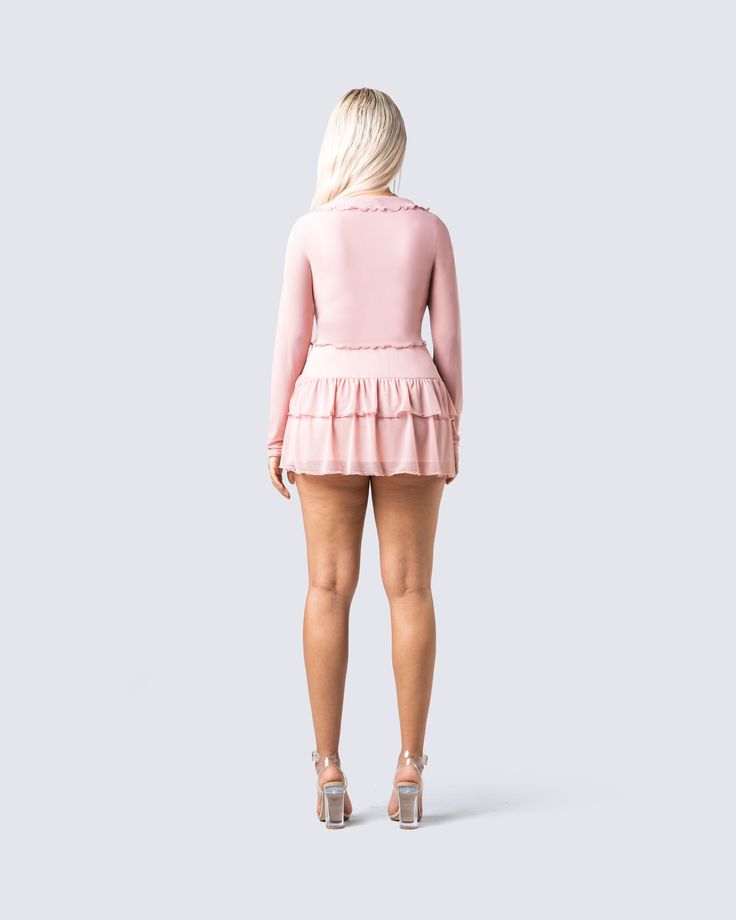 It's your world, and they're just living in it. Make yourself known in this sweet, but sassy two-piece set 💖 Featuring a flirty pink mesh long-sleeve top, and ruffle mini skirt for a look that will bring out your attitude in a way they can't help but love 😚 Flirty Pink Tiered Skirt Mini Dress, Flirty Pink Mini Dress With Tiered Skirt, Pink Long Sleeve Mini Dress With Ruffle Hem, Flirty Ruffled Mini Skirt For Night Out, Flirty Ruffle Hem Mini Skirt For Night Out, Flirty Mini Skirt With Ruffle Hem For Night Out, Feminine Ruffle Hem Mini Skirt For Party, Feminine Party Mini Skirt With Ruffle Hem, Pink Fitted Mini Dress With Tiered Skirt