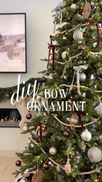 a christmas tree with ornaments on it and the words diy bow ornament