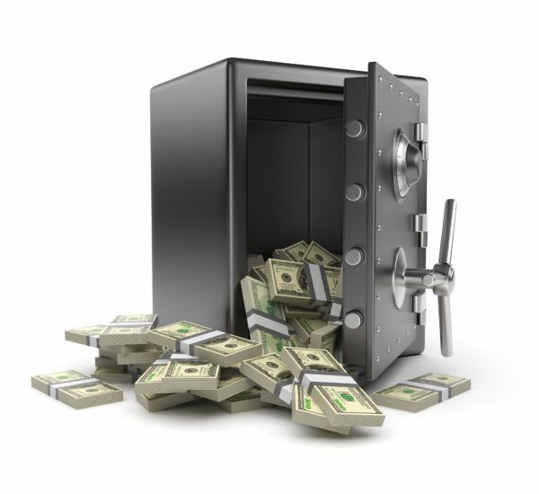 a bunch of money is coming out of a safe