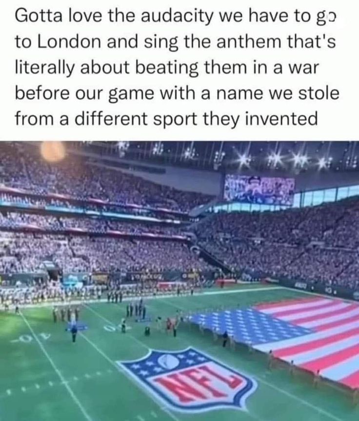 an american flag is on the field at a football game