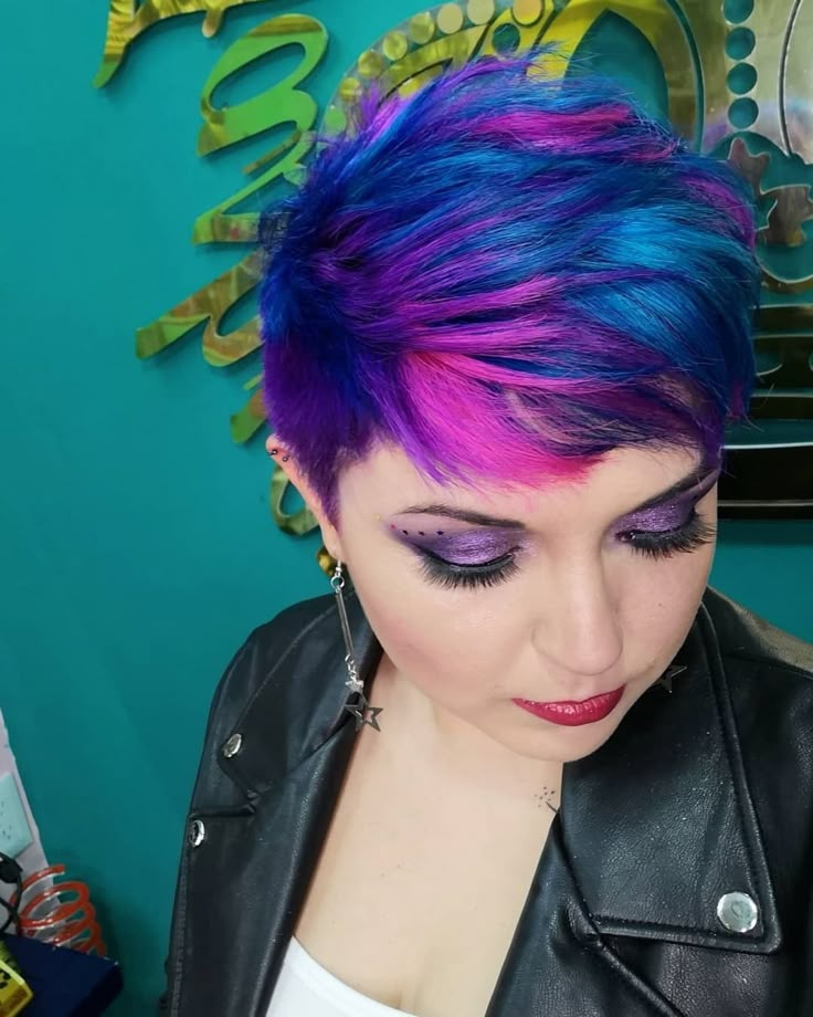 Pixie color, bi pride hair Galaxy Pixie Hair, Bright Colours For Short Hair, Mermaid Pixie Hair, Vivid Hair Color Pixie, Pink Purple Hair Short, Coloured Pixie Hair, Pink And Purple Pixie Hair, Blue Undercut Hair, Short Hair Fashion Color