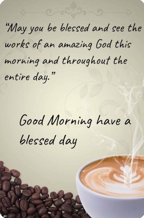 a cup of coffee sitting on top of a pile of coffee beans with the words good morning have a blessed day