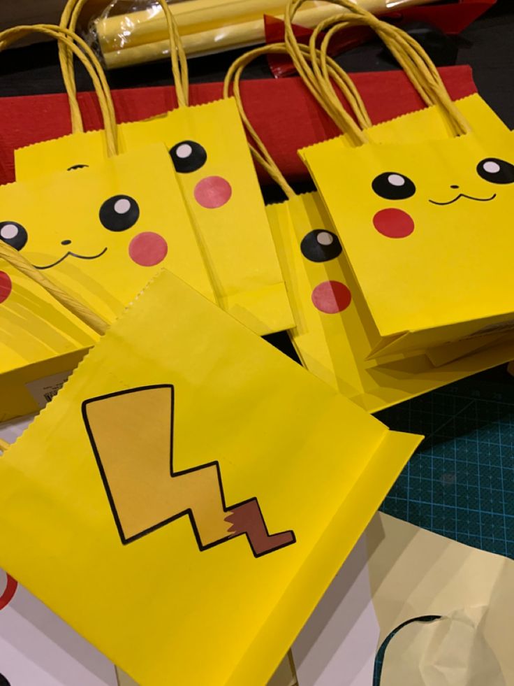 yellow paper bags with faces and eyes on them