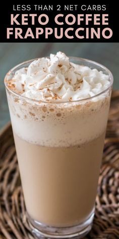 a glass filled with coffee and whipped cream