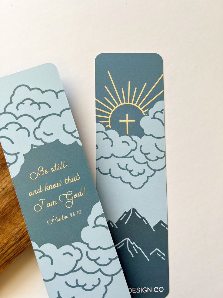 two bookmarks with the words, be still and know that i am god on them