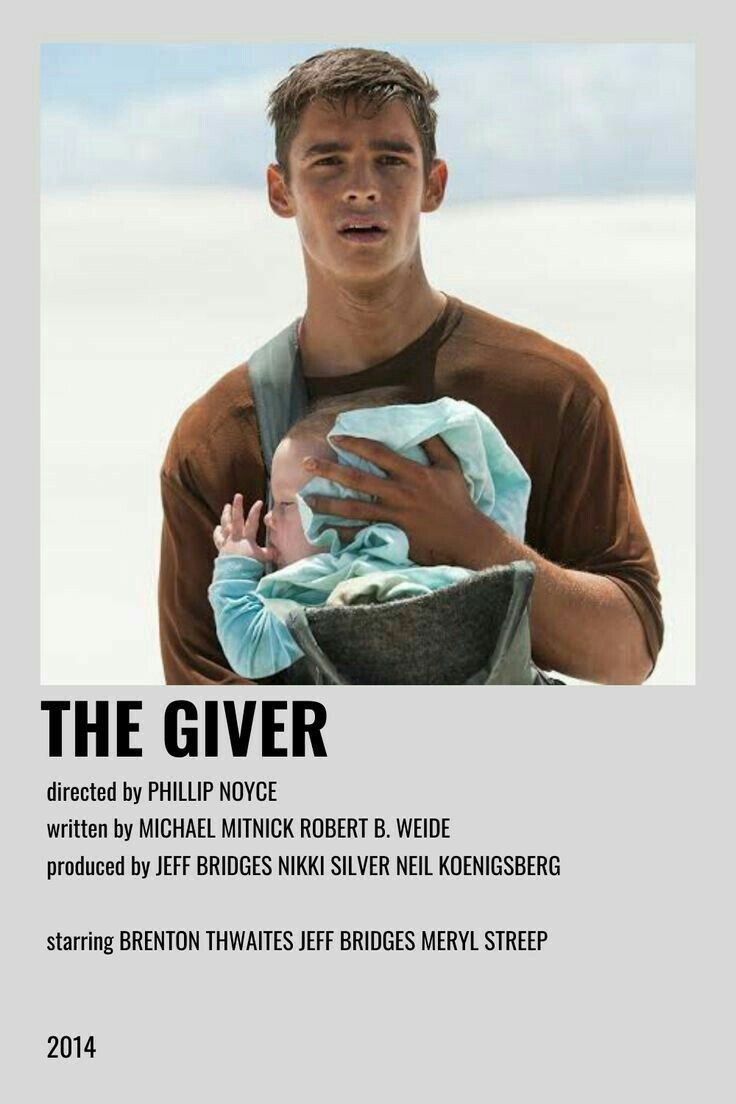 a man holding a baby in his arms with the caption'the giver '