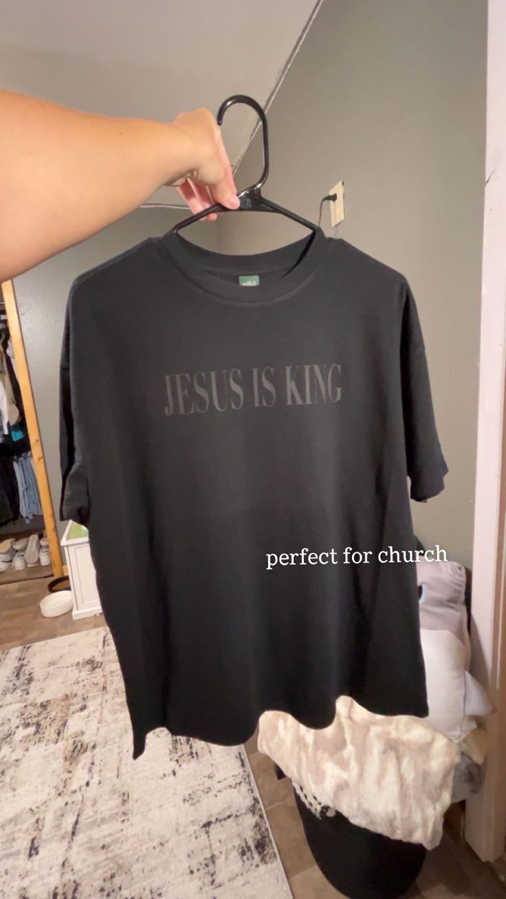 Black Tshirt that says Jesus Is King. Runs big. Hey everyone, I have a small business where I make and sell custom/personalized tees and tanks. Mostly, everything runs true to size. Feel free to direct message me for more information. Cute Christian Tshirt, Aesthetic Christian Shirts, Custom Text Black Cotton T-shirt, Black Cotton T-shirt With Custom Text, Christian Tshirt Design Ideas, Goth Christian, Jesus Shirts Christian Clothing, Christian Tees Women, Jesus T Shirts