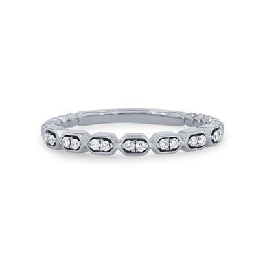 This contemporary geometric band features 0.08 carats of round brilliant cut diamonds. Worn with an engagement ring or as part of a stack, it is sure to make a statement. Stackable Diamond Ring With Open Band, Stackable Diamond Wedding Ring With Open Band, Modern Diamond Stackable Bands, Modern Stackable Diamond Bands, Modern Jewelry With Single Cut Diamonds In Round Band, Modern Stackable Rings With Single Cut Diamonds For Anniversary, Diamond Stackable Rings With Single Diamond, Modern Diamond Eternity Band With Round Cut, Diamond Stackable Rings With Open Band