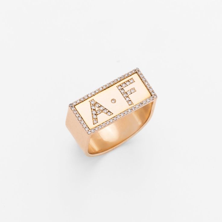 14K Yellow Gold 78 Diamonds Size: 2mm x 0.9mm Initials Customized E-mail us the letters of your choice along your order number Please allow up to 4 weeks for the delivery of made to order customized letters. Anniversary Initial Ring With Rectangular Shape, Personalized Initial Ring In White Gold, Luxury Monogram Initial Ring For Anniversary, Luxury Personalized Initial Ring For Anniversary, Personalized Luxury Initial Ring For Anniversary, Luxury Personalized White Gold Initial Ring, Luxury Personalized Initial Ring, Yellow Gold Initials Ring, Gold Diamond Initial Ring