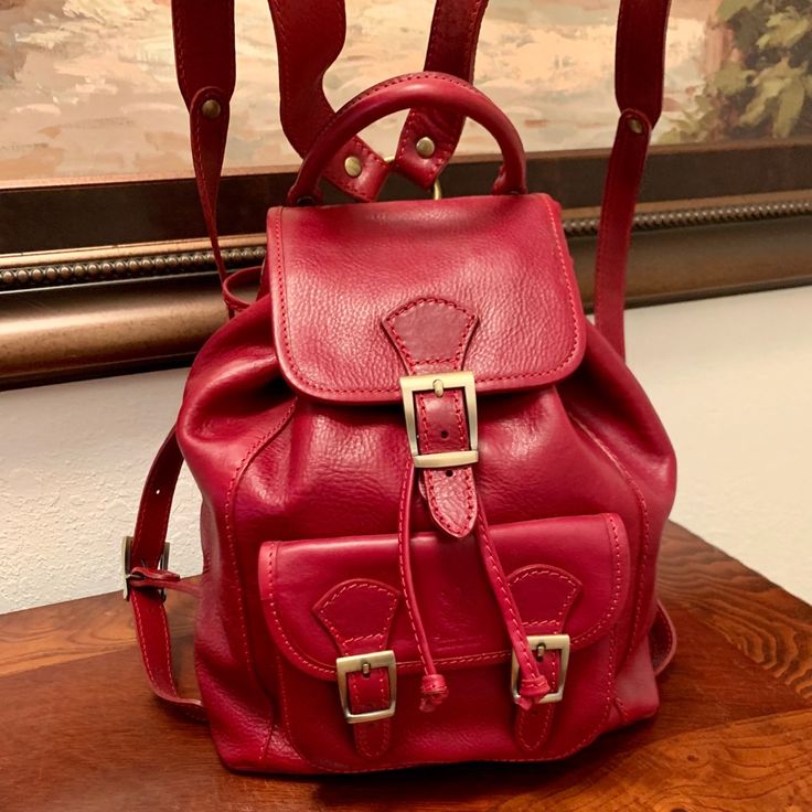 Genuine Leather Backpack By Vera Pelle, Made In Florence Italy The Genuine Italian Leather Crossbody Saddle Handbag Is Defined By It's Curved Shape And Finely Detailed Stitching. Perfect For Year-Round. Size, Large: 12” X 14 1/2” Adjustable Leather Straps Luxury Leather Shoulder Backpack For School, Daily Use Burgundy Leather Backpack, Leather Backpack With Adjustable Strap In Burgundy, Classic Red Backpack For Daily Use, Luxury Red Backpack Bags, Leather Burgundy Backpack With Adjustable Strap, Burgundy Leather Travel Backpack, Classic Red Leather Backpack, Burgundy Leather Standard Backpack