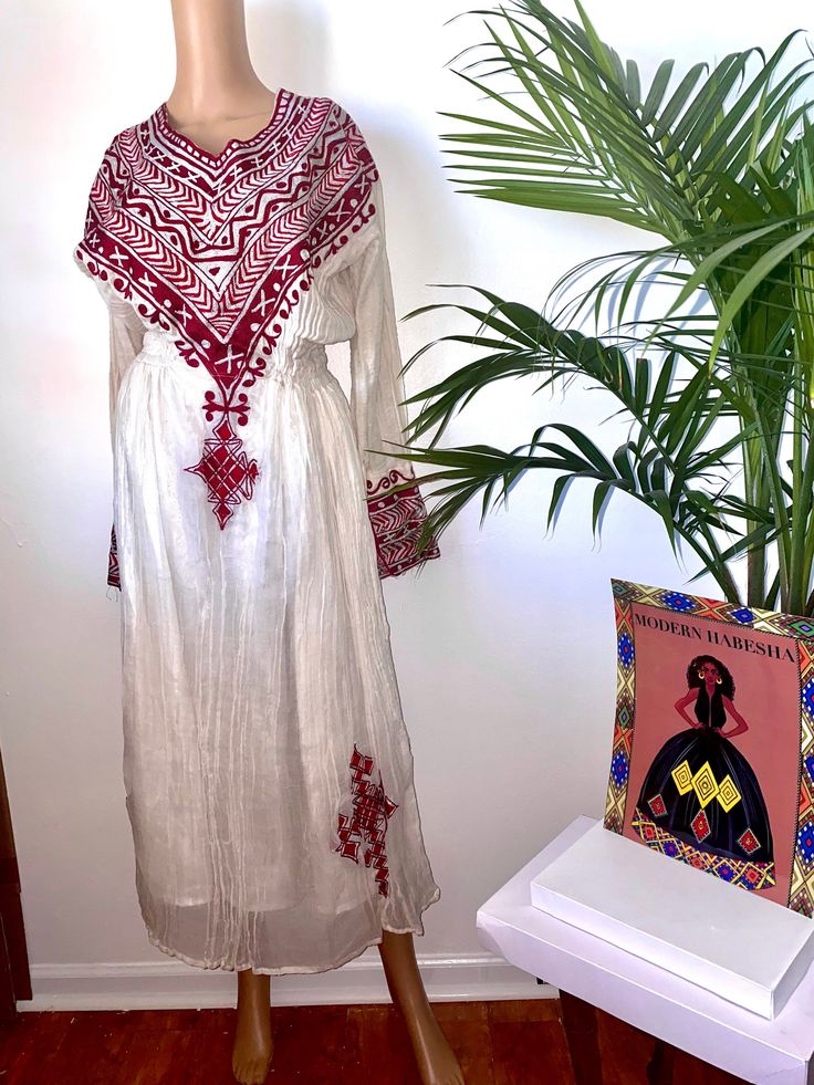 Fits size small Bohemian Ceremonial Dress With Traditional Patterns, Bohemian Handloom Dresses For Traditional Ceremonies, Bohemian Dresses For Eid Ceremonies, Bohemian Ceremonial Dresses With Woven Motifs, White Bohemian Ceremonial Dress, Bohemian Dresses With Woven Motifs For Eid, White Bohemian Dress For Ceremonial Use, White Bohemian Dress For Ceremonial Occasions, Bohemian Embroidered Maxi Dress For Traditional Ceremonies