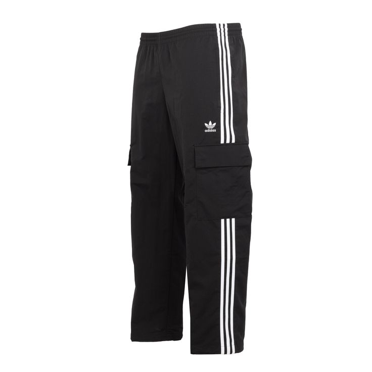 Fashion meets function with these adidas cargo pants. A tried and true style gets updated with ripstop material and tactical pockets that are perfect for storing your goods. Pair them with a favorite tee or jacket, and get out there. From checking the mail to hitting the road, you'll be ready. The adjustable closures at all points ensure the perfect fit. Loose fit. Elastic waist with drawcord. Side zip pockets and cargo pockets with snap buttons. Bungee adjustable hems. Made with recycled materi Adidas Cargo Pants, Adidas Cargo, Tried And True, Cargo Pant, Cargo Pants Men, Cargo Pants, Side Zip, Adidas Originals, The Road