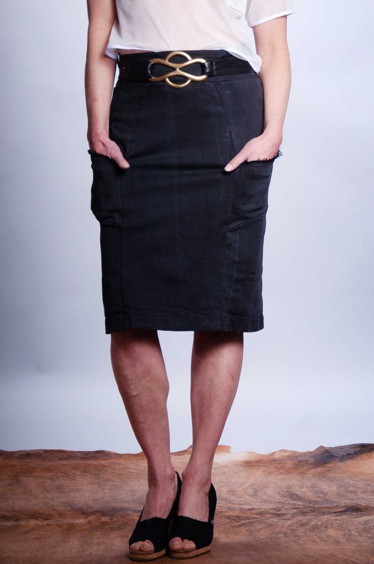 Distressed black denim super stretchy pull on pencil skirt. Princess seam detailing with frayed edge pockets. Double kick pleat at back princess seams for movement and added interest. Style with: Spot On Blazer, Ashley Top, Sensored Top, Katrina Top. Content: Cotton/Lycra Care: Machine wash cold. Tumble dry low. Remove immediately. Made in: Portland, OR Model is 5’6” and is wearing size S, and 5'3" and wearing size XS. Kick Pleat, Princess Seams, Princess Seam, Black Denim, Portland, Pencil Skirt, Pencil, Blazer, Skirt