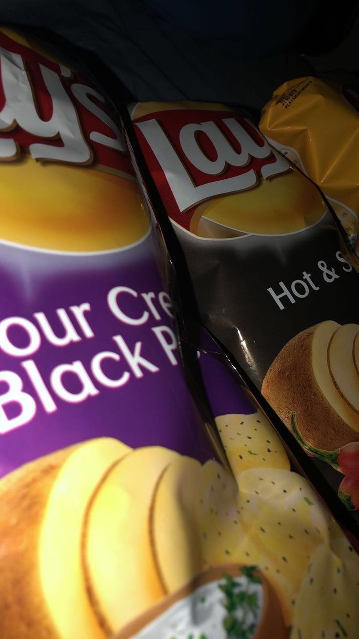 two bags of chips sitting next to each other