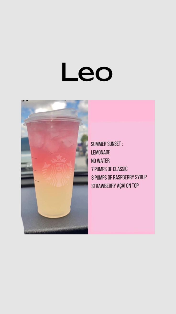 a pink and yellow drink sitting on top of a table next to a sign that says leo