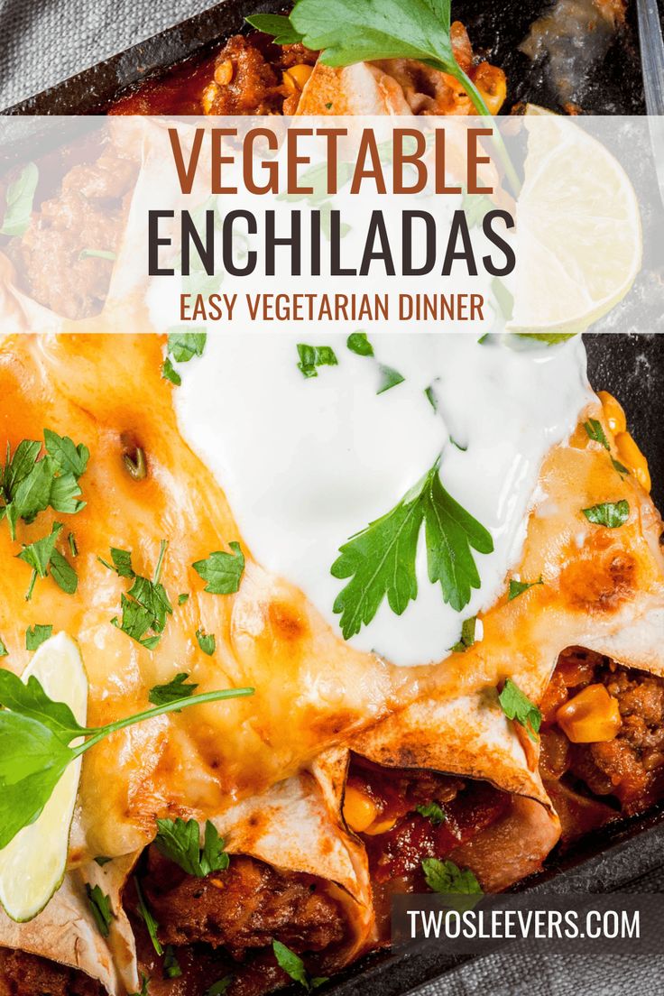 an enchiladas dish with meat, cheese and cilantro on top