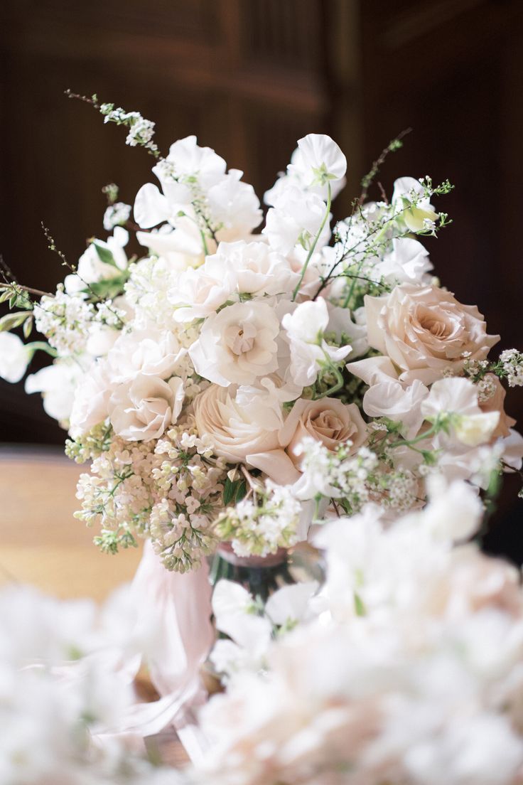 a bouquet of flowers sitting on top of a table