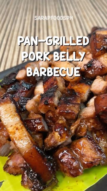 grilled pork belly with barbecue sauce on a green plate