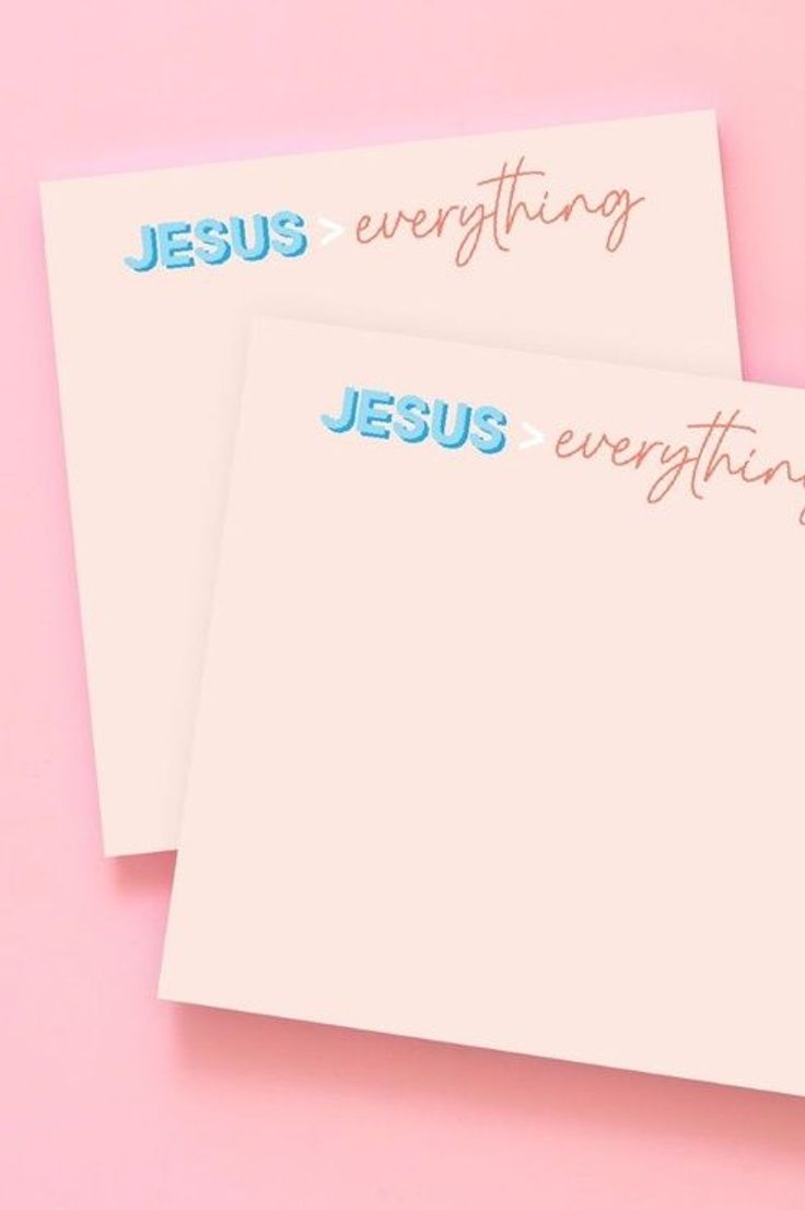 two envelopes with the words jesus and everything else on them against a pink background