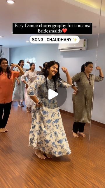 a group of women dancing in a dance studio