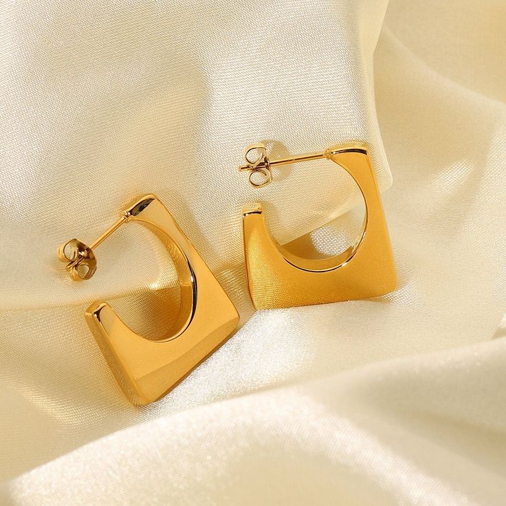 Embrace bold style with Geometric Earrings, artfully crafted in 18k gold-filled. These earrings feature a striking mix of geometric shapes, perfect for adding a contemporary and artistic touch to any fashion-forward ensemble. Contemporary Rectangular Gold Jewelry, Modern Gold Plated Earrings For Gift, Modern Gold-plated Earrings As Gift, Contemporary Gold Hoop Earrings As Gift, Modern Yellow Gold Hoop Earrings, Modern Square Hoop Earrings Tarnish Resistant, Contemporary Gold Hoop Earring, Modern Gold Rectangular Hoop Earrings, Modern Gold Plated Pierced Earrings