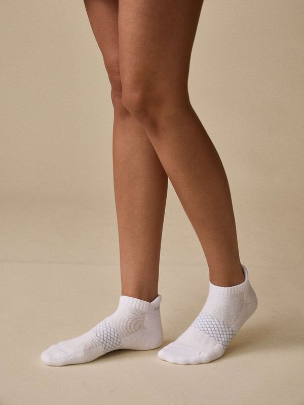 Shop Women’s Luxury Resort Wear | A. PUTNAM Comfortable White Anti-odor Socks, Sporty Socks With Arch Support And Micro-elastic Fit, White Stretch Socks With Arch Support, Comfortable Functional White Socks, Comfortable White Functional Socks, Sporty No-show Comfortable Socks, Lightweight Sporty No-show Socks, Lightweight Comfortable White Socks, Comfortable Lightweight White Socks