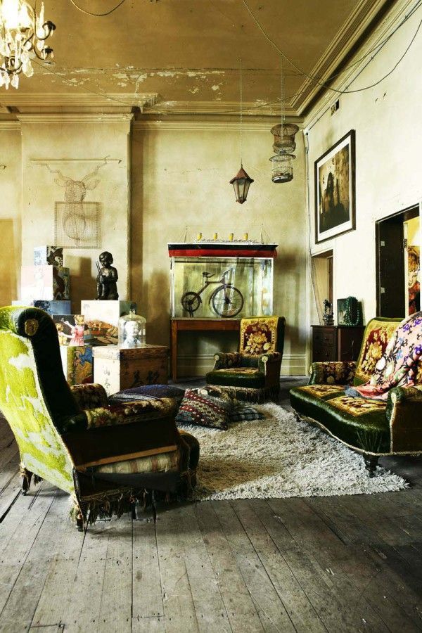 an old fashioned living room filled with furniture