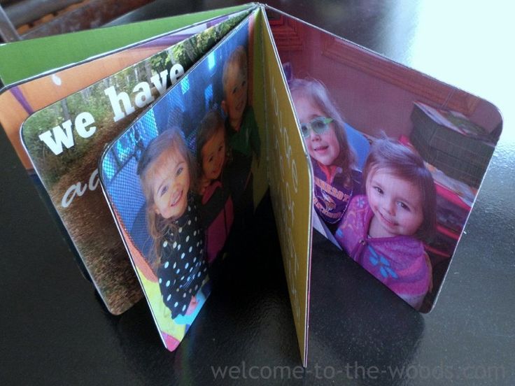 two children's pictures are placed inside an open photo book with the words we have always seen