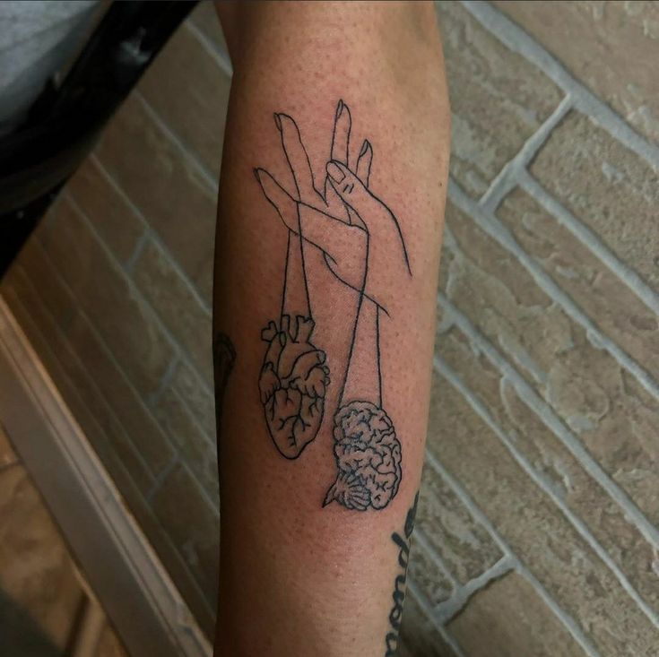 a person with a tattoo on their arm