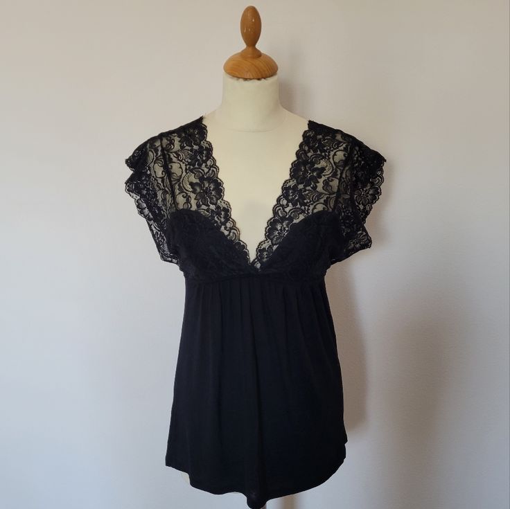 - New Without Tags - Excellent Condition - Beautiful Lace Detail - 94% Rayon, 6% Spandex Stretch Lace Trim Tops For Date Night, Stretch Black Tops For Daywear, Black Lace Trim Top For Loungewear, Forever 21 Elegant Black Top, Elegant Black Top By Forever 21, Elegant Black Forever 21 Top, Forever 21 Fitted Top With Lace Trim, Fitted Forever 21 Top With Lace Trim, Fitted Forever 21 Tops With Lace Trim