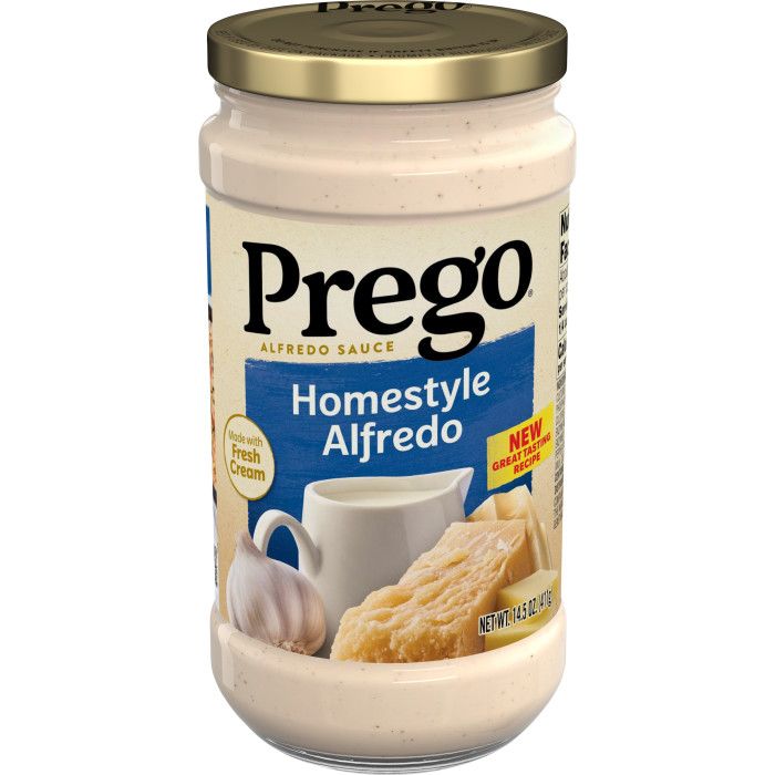 a jar of prego homestyle alfredo on a white background