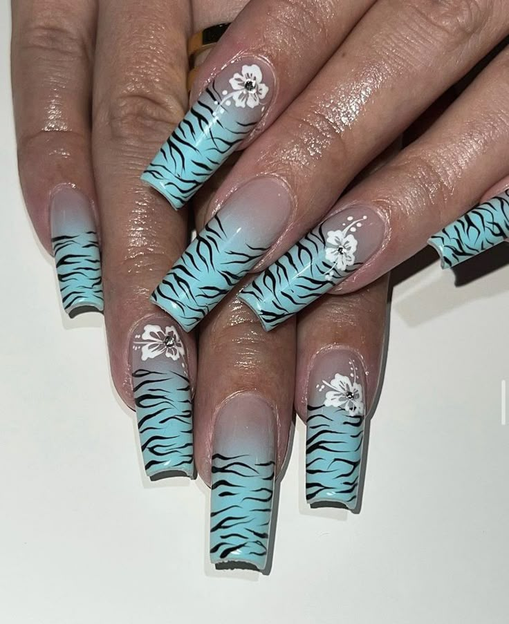 nails by: @nailedbyyans (on IG) Blue Tiger Print Nails, Blue Tiger Nails, Zebra Print Nails Y2k, Blue Grunge Nails, Blue Zebra Nails, Tiger Stripe Nails, Tiger Nails, Zebra Print Nails, Unique Nail Art