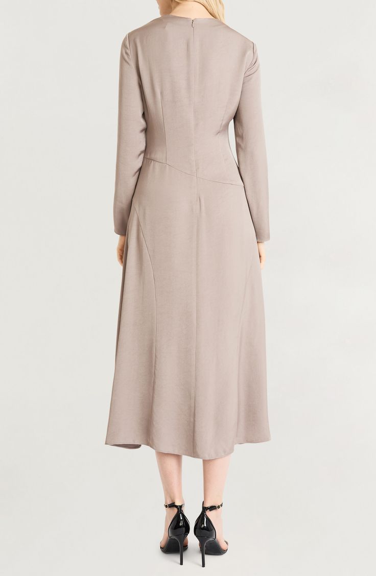 Seamed details bring shape to this long-sleeve midi dress that gently flutters as you move. 51 1/2" length Back zip closure Funnel neck Long sleeves 100% polyester Machine wash, tumble dry Imported Elegant Long Sleeve Dress With Back Zipper, Long Sleeve Viscose Maxi Dress For Fall, Chic Long Sleeve Viscose Midi Dress, Long Sleeve Viscose Midi Dress For Formal Occasions, Long Sleeve Viscose Midi Dress For Evening, Elegant Long Sleeve Viscose Maxi Dress, Formal Long-sleeve Midi Dress In Viscose, Evening Long Sleeve Viscose Midi Dress, Spring Long Sleeve Dress With Back Zipper