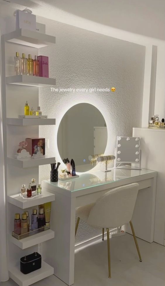 a white desk with a mirror and some bottles on top of it in a room