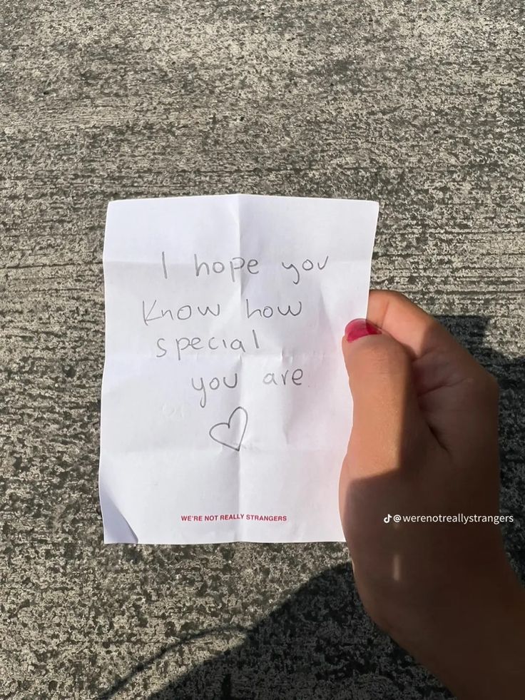 someone holding up a piece of paper that says i hope you know how special you are